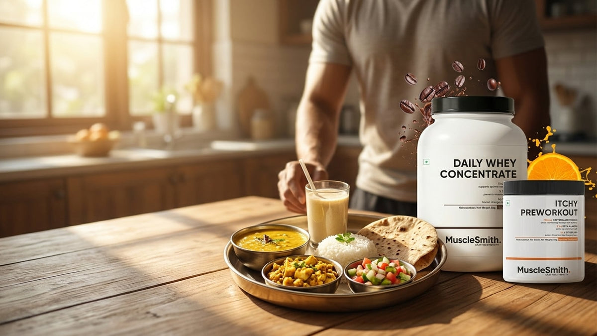 An Indian vegetarian meal with dal, paneer, rice, and a sattu drink on a wooden table.