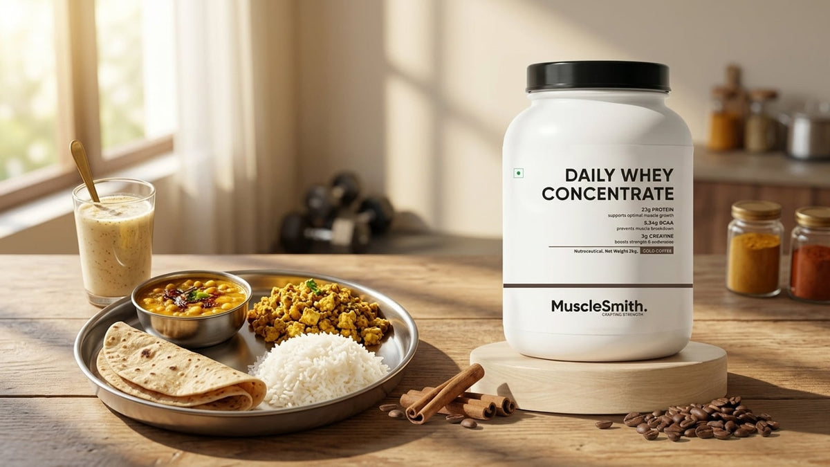 An Indian vegetarian meal with dal, paneer, rice, and roti on a wooden table.