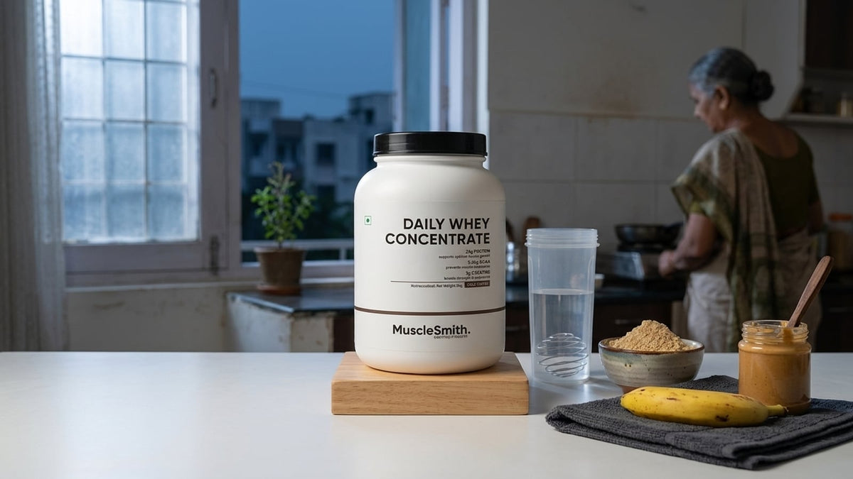 Pre-workout sattu, banana, and peanut butter on an Indian kitchen counter.